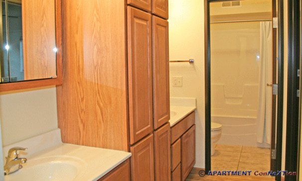Double Sink Compartmentalized Bathroom