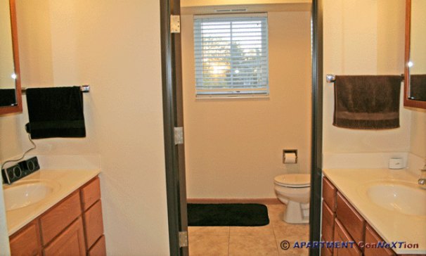 Double Sink Compartmentalized Bathroom